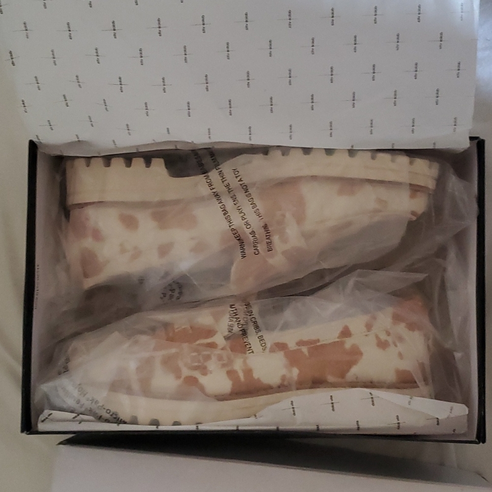 Dolce Vita White and Tan Cowprint Loafers - Picture 5 of 11